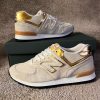 New Balance 574 Azul Camel